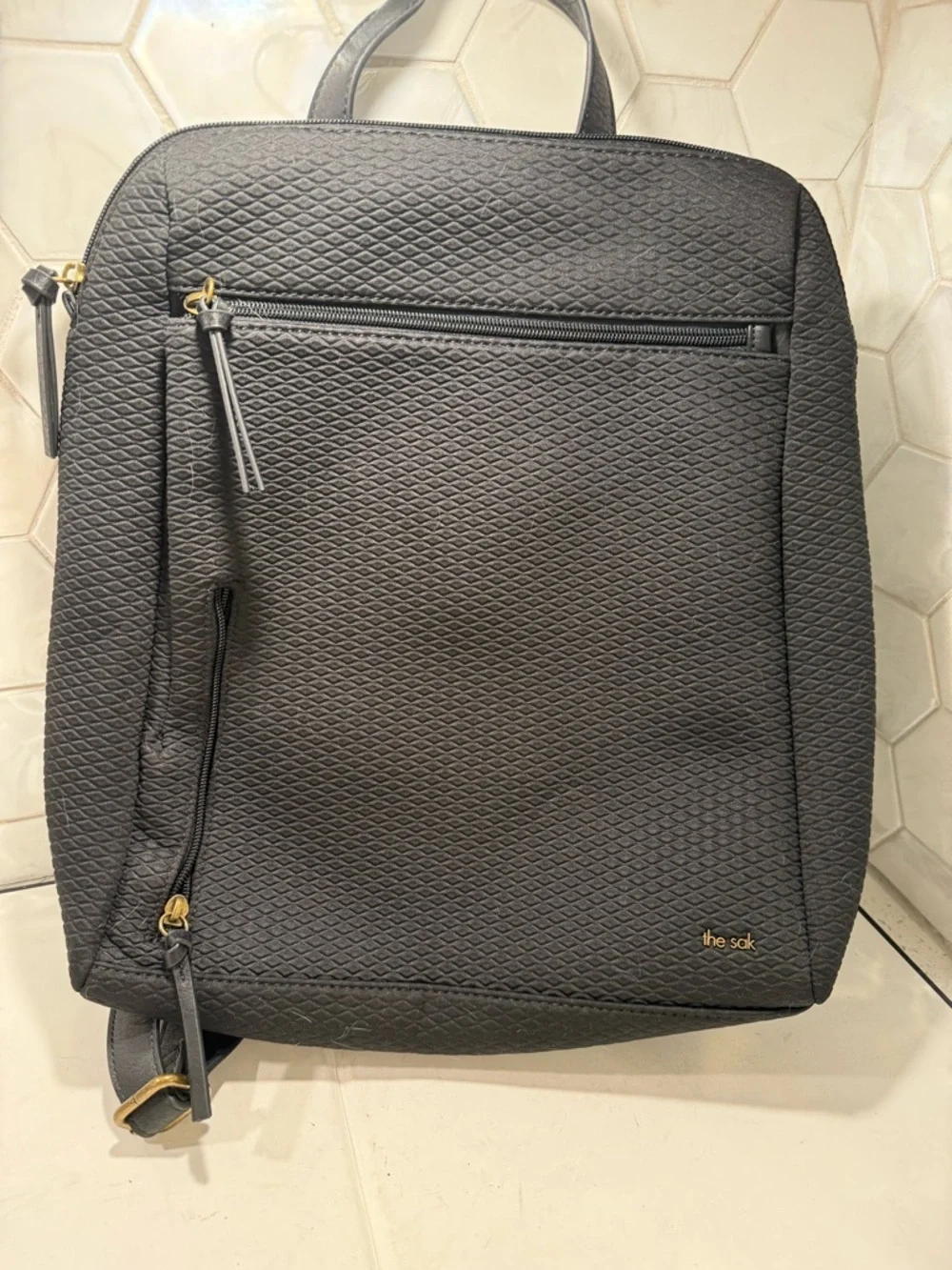 The Sak Olvera Metro Backpack NWT Black Embossed Fabric Adjustable Goldtone